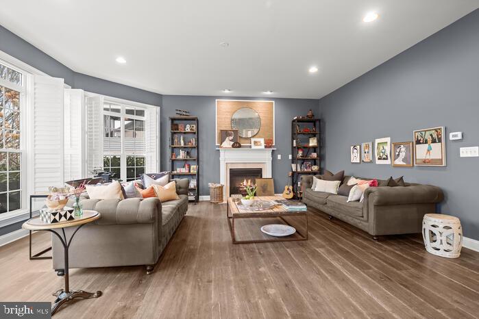 2520 Stone Cliff Drive Baltimore, MD 21209 - Photo 65 of 72 a living room with fireplace furniture and a large window