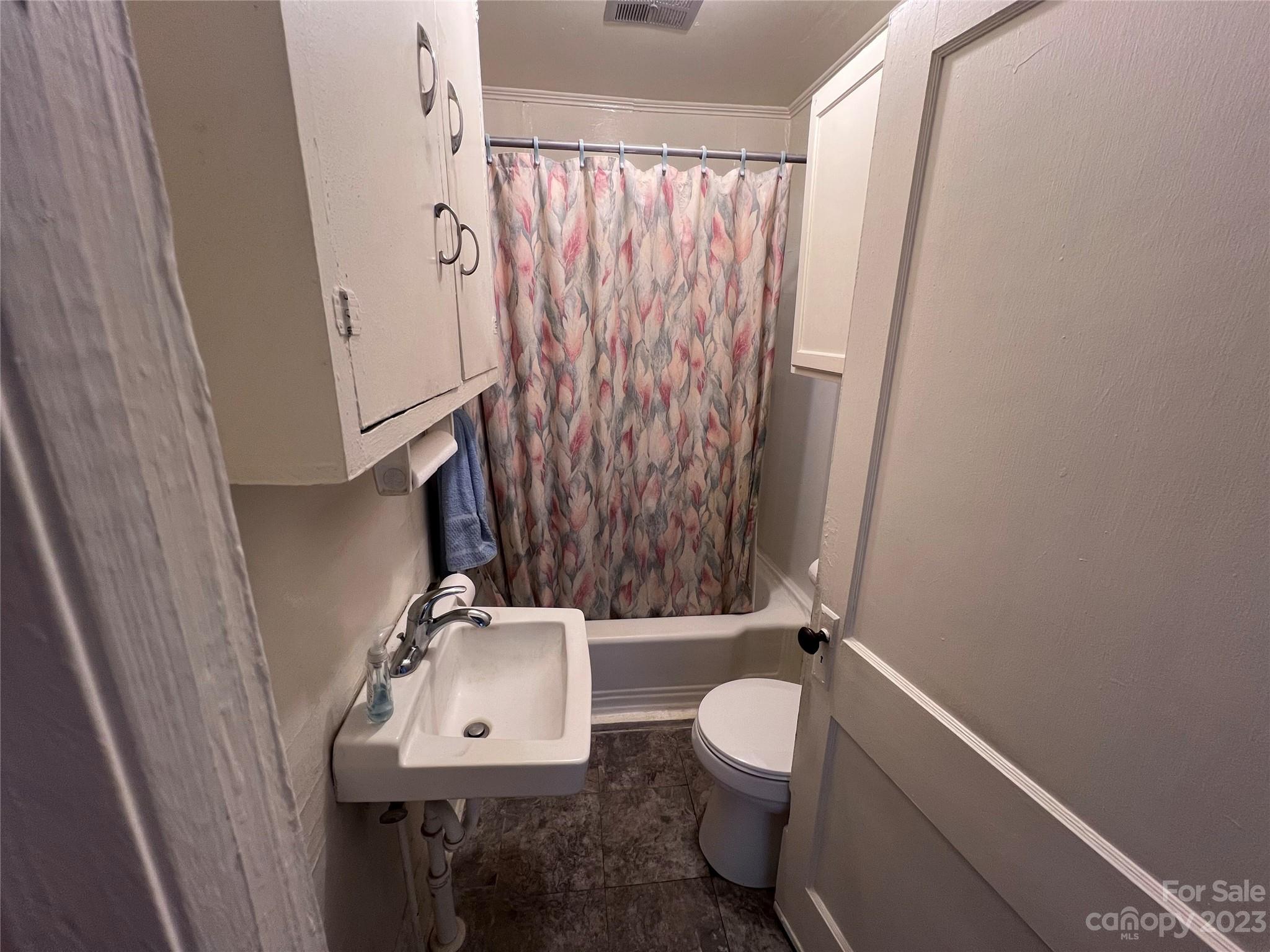 127 River Loop Road Belmont, NC 28012 - Photo 20 of 34 a bathroom with a sink toilet and shower
