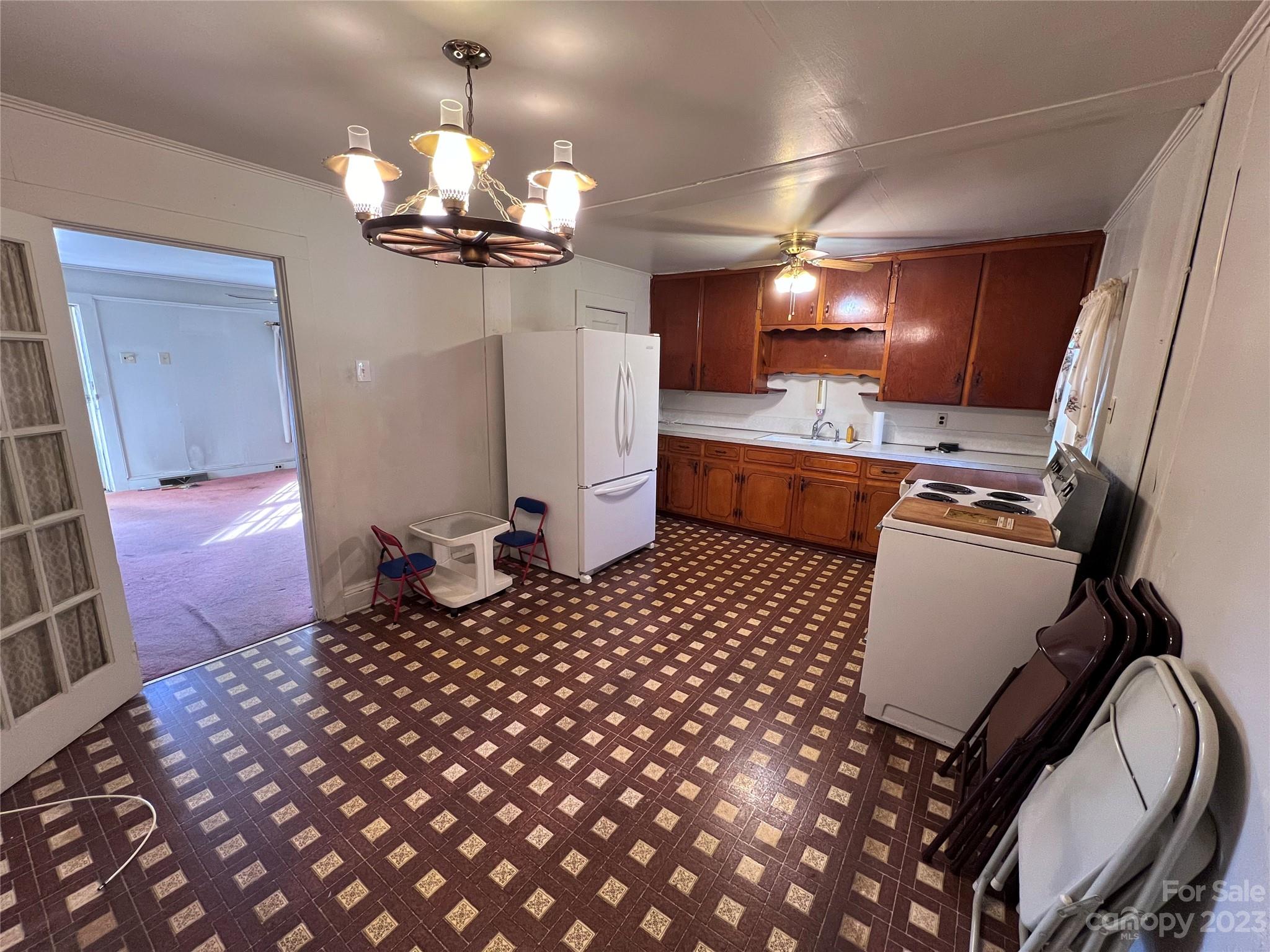 127 River Loop Road Belmont, NC 28012 - Photo 23 of 34 a kitchen with a sink a counter and cabinets