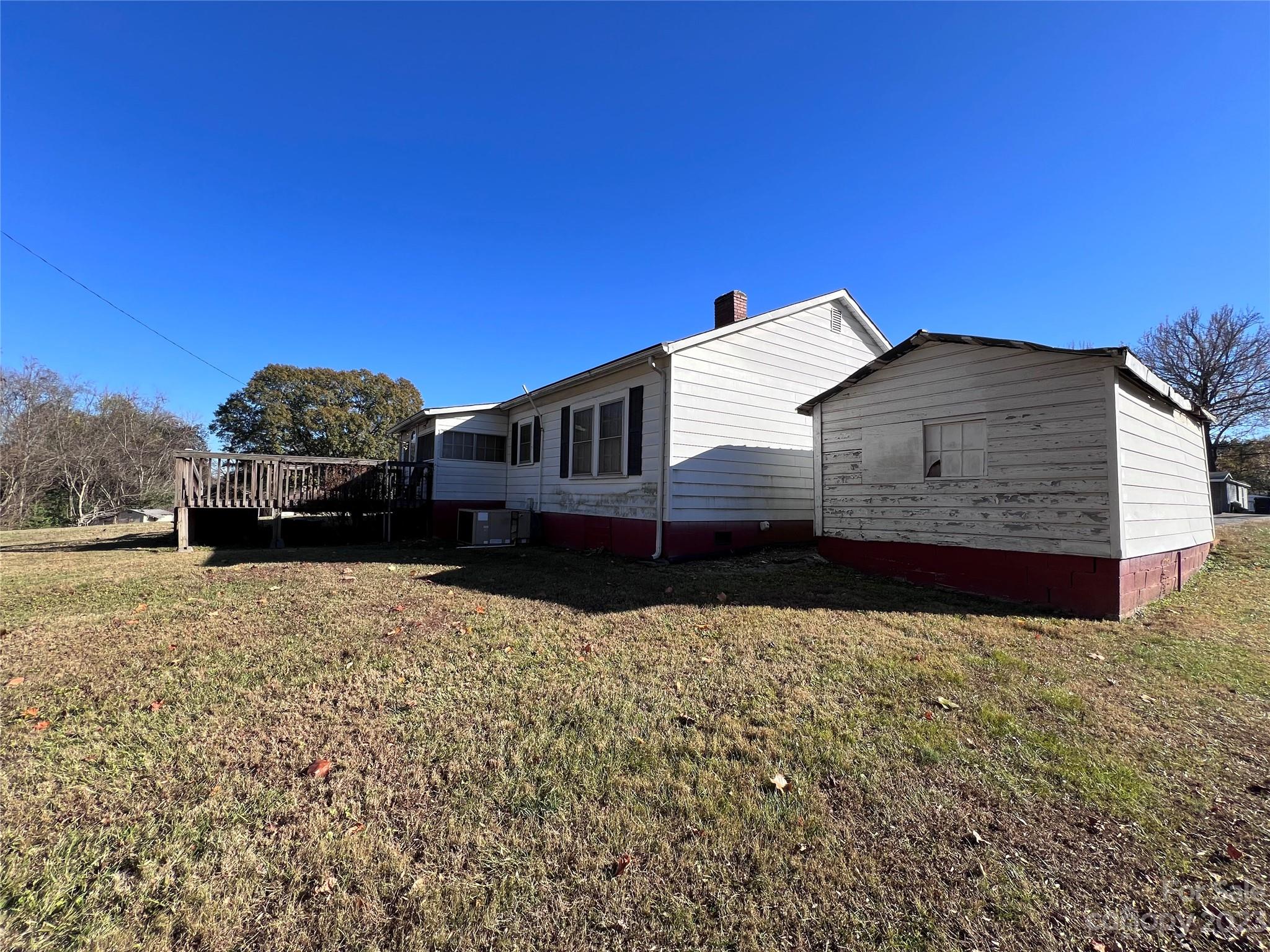 127 River Loop Road Belmont, NC 28012 - Photo 8 of 34 a view of a house with a yard