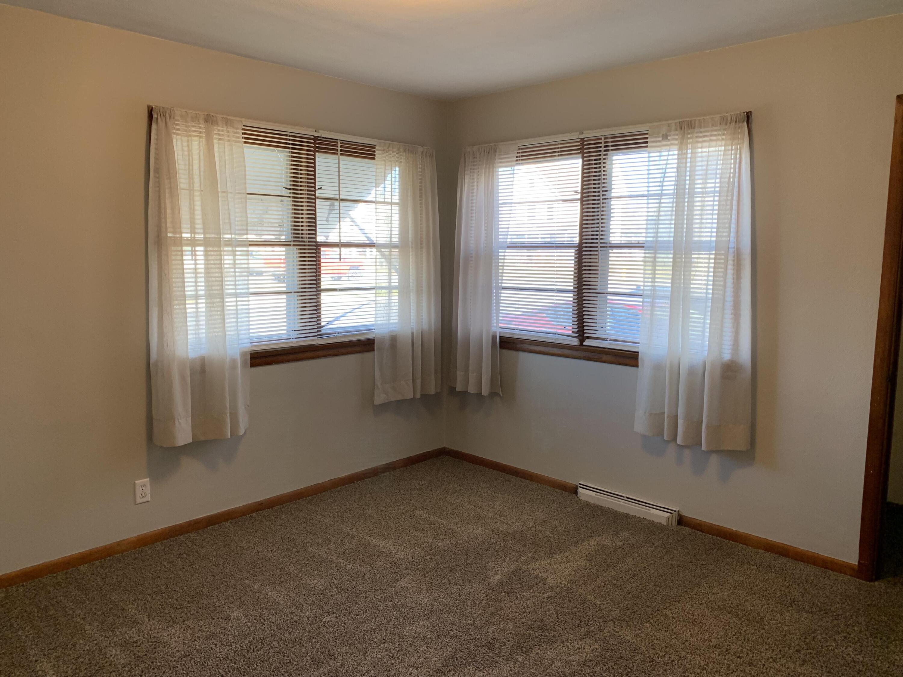 111 West Rutsen Street Rensselaer, IN 47978 - Photo 12 of 21 an empty room with windows