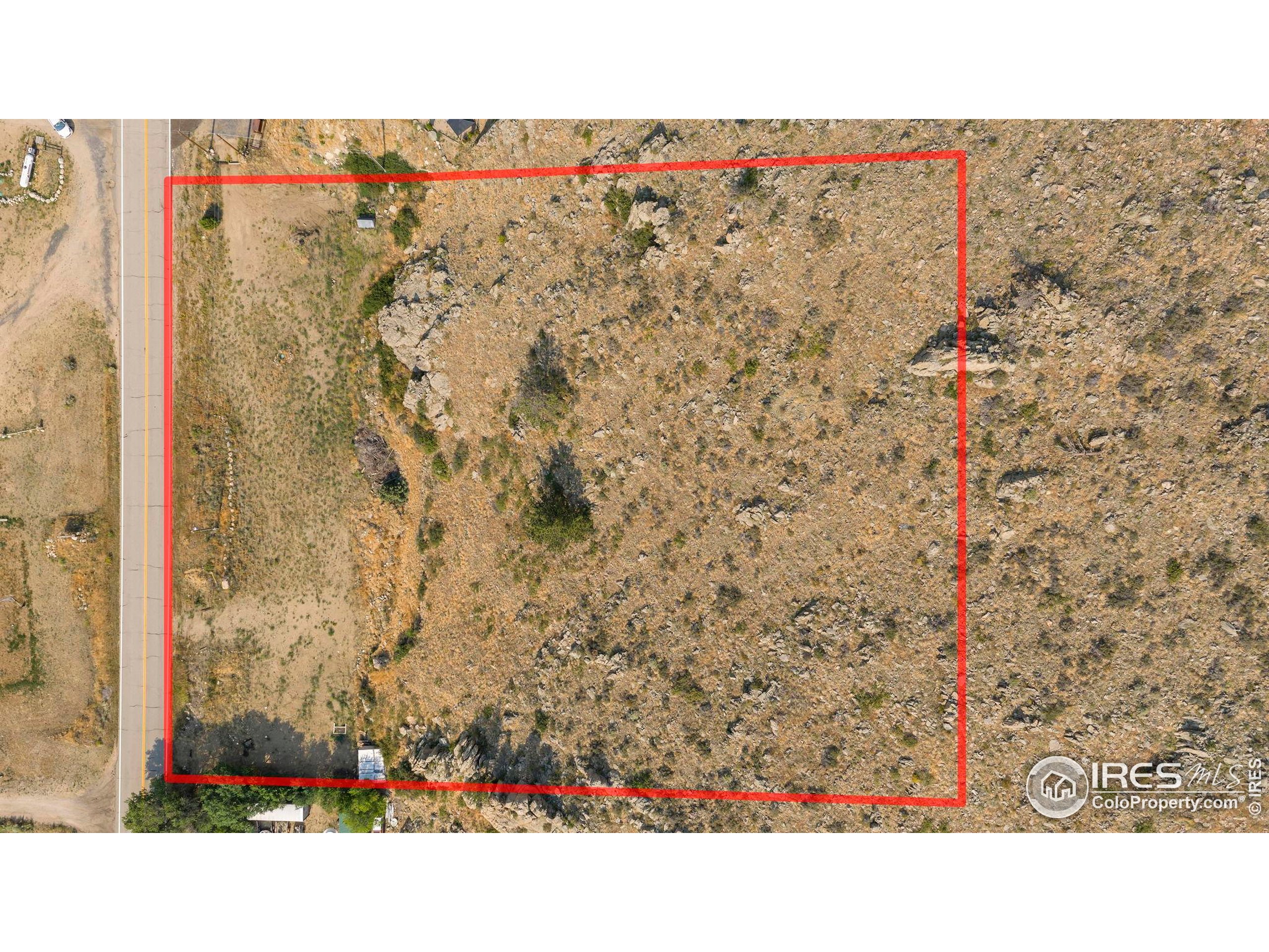 33032 Poudre Canyon Road Bellvue, CO 80512 - Photo 7 of 10 a black and white photo of a wall