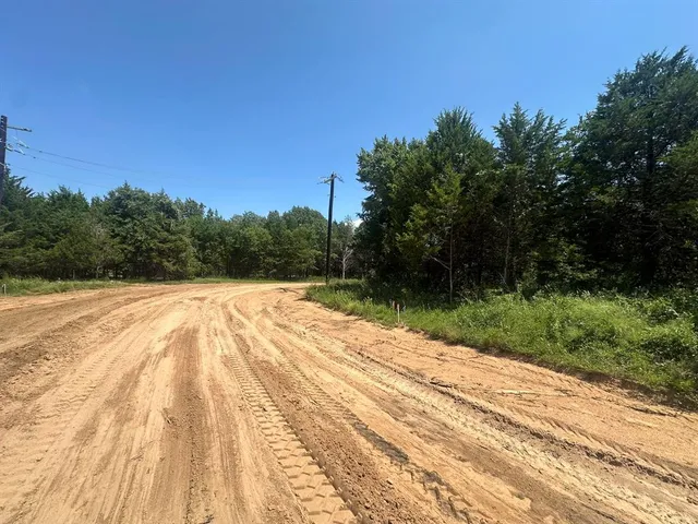 a view of room with wooden floor