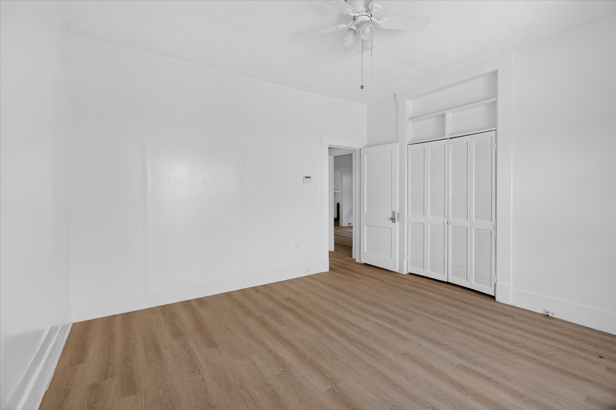1607 Holman Street Houston, TX 77004 - Photo 20 of 24 a view of an empty room with a window