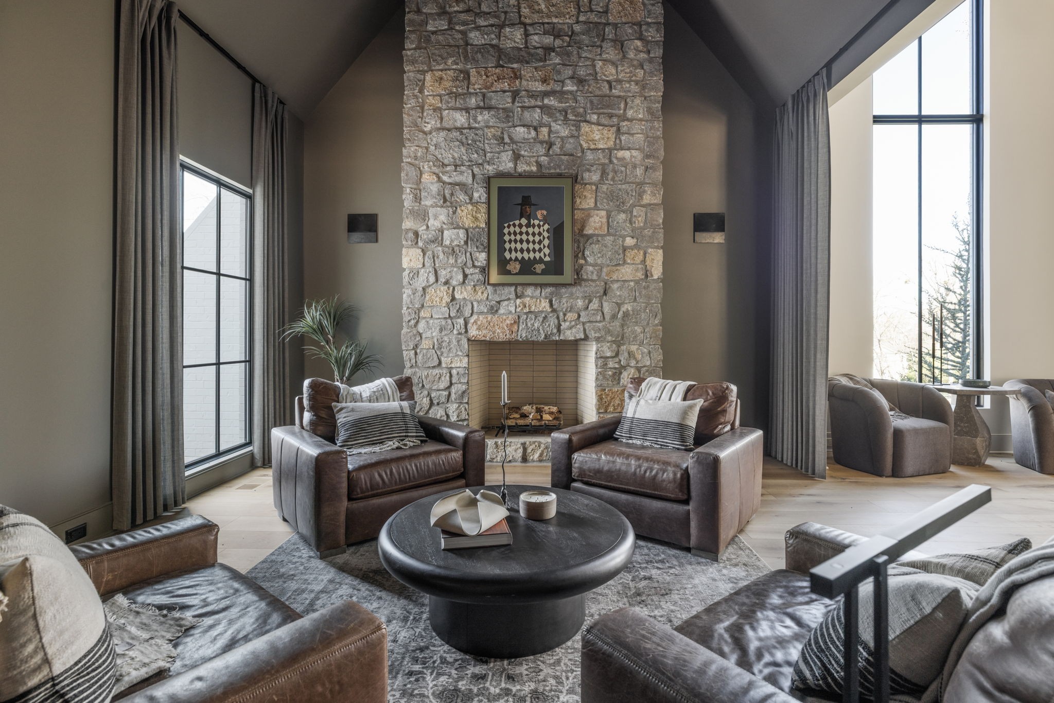 1049 Overton Lea Road Nashville, TN 37220 - Photo 15 of 53 a living room with furniture a fireplace and a large window
