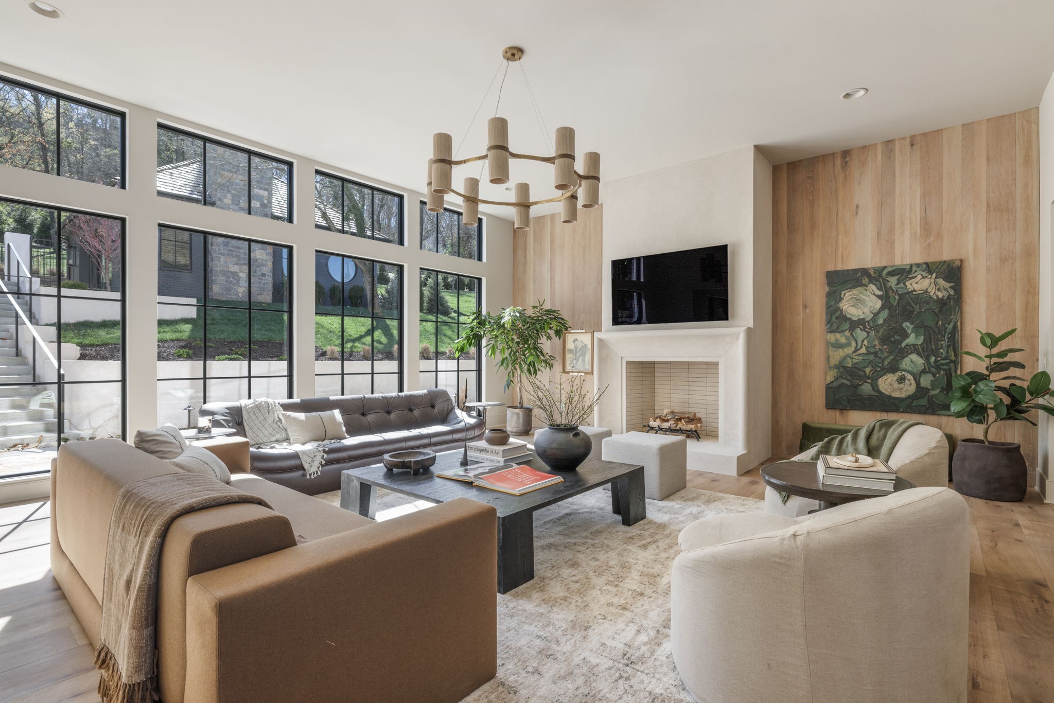 1049 Overton Lea Road Nashville, TN 37220 - Photo 17 of 53 a living room with fireplace furniture and a flat screen tv