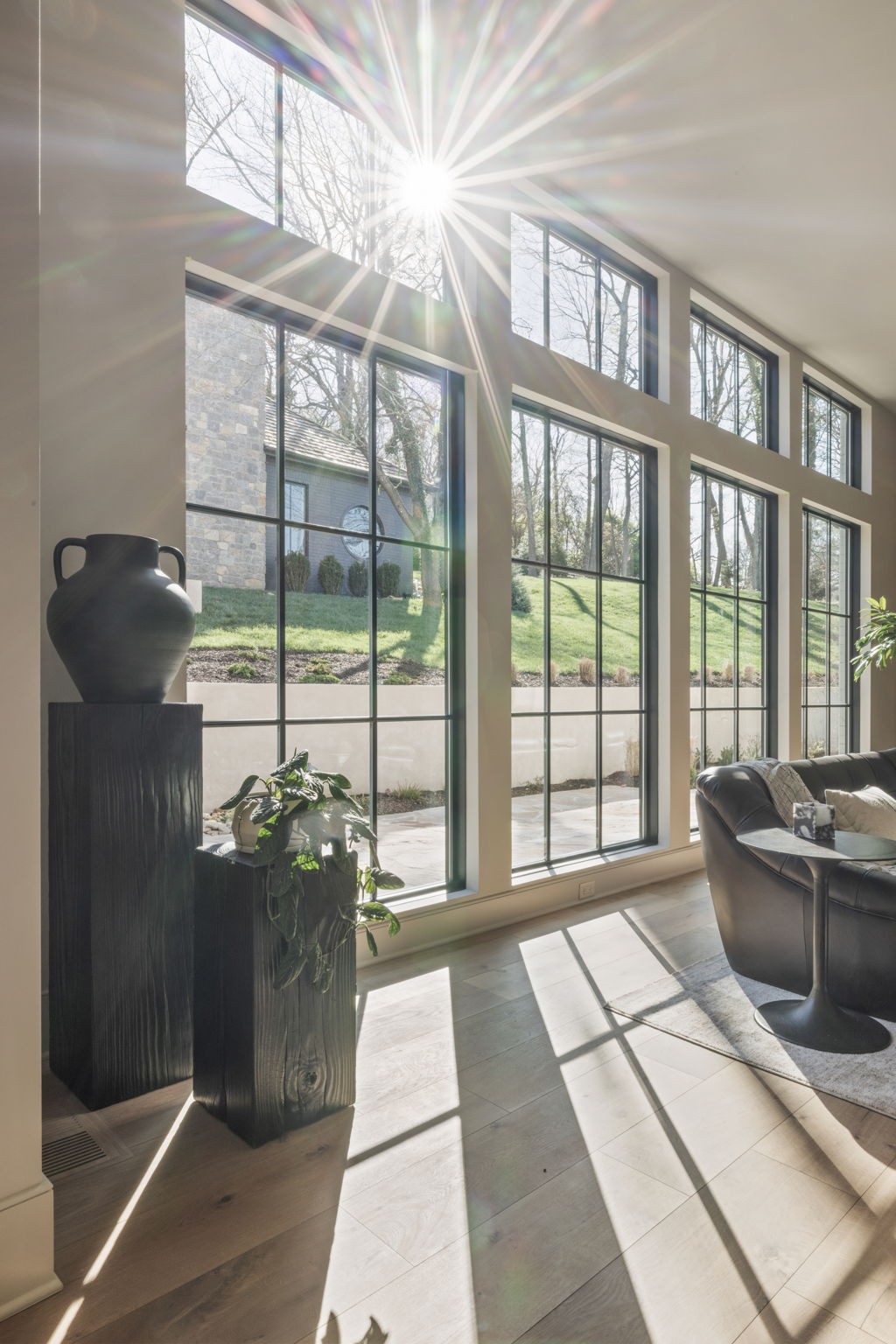 1049 Overton Lea Road Nashville, TN 37220 - Photo 19 of 53 a living room with furniture and a floor to ceiling window