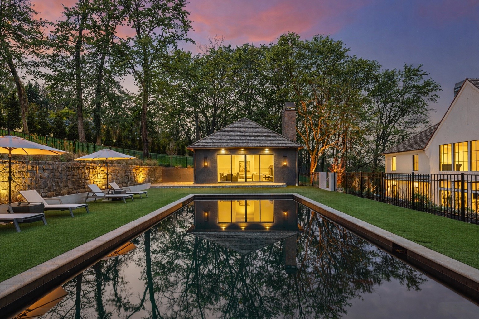 1049 Overton Lea Road Nashville, TN 37220 - Photo 2 of 53 a view of a swimming pool with a yard