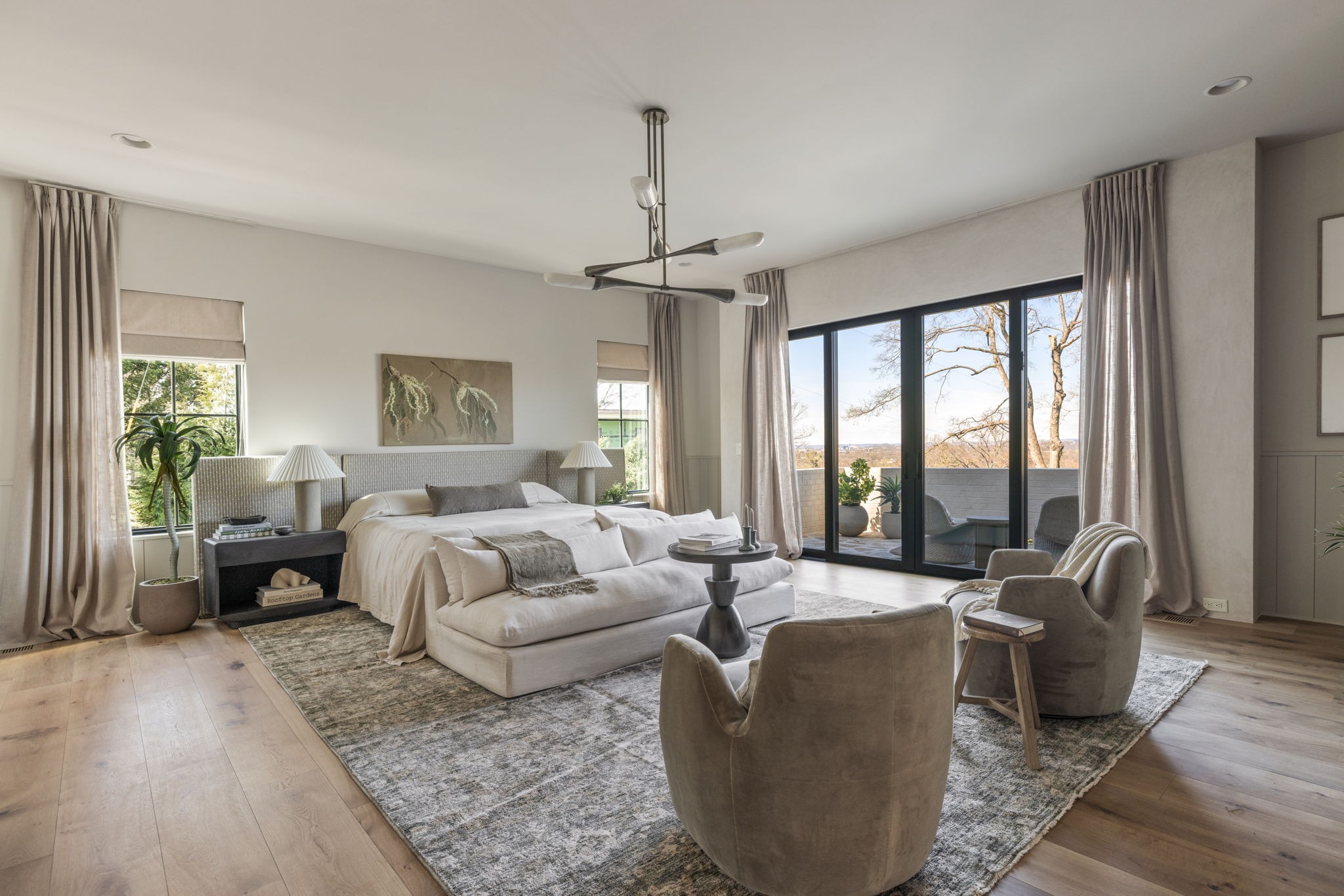 1049 Overton Lea Road Nashville, TN 37220 - Photo 27 of 53 a living room with furniture and a chandelier