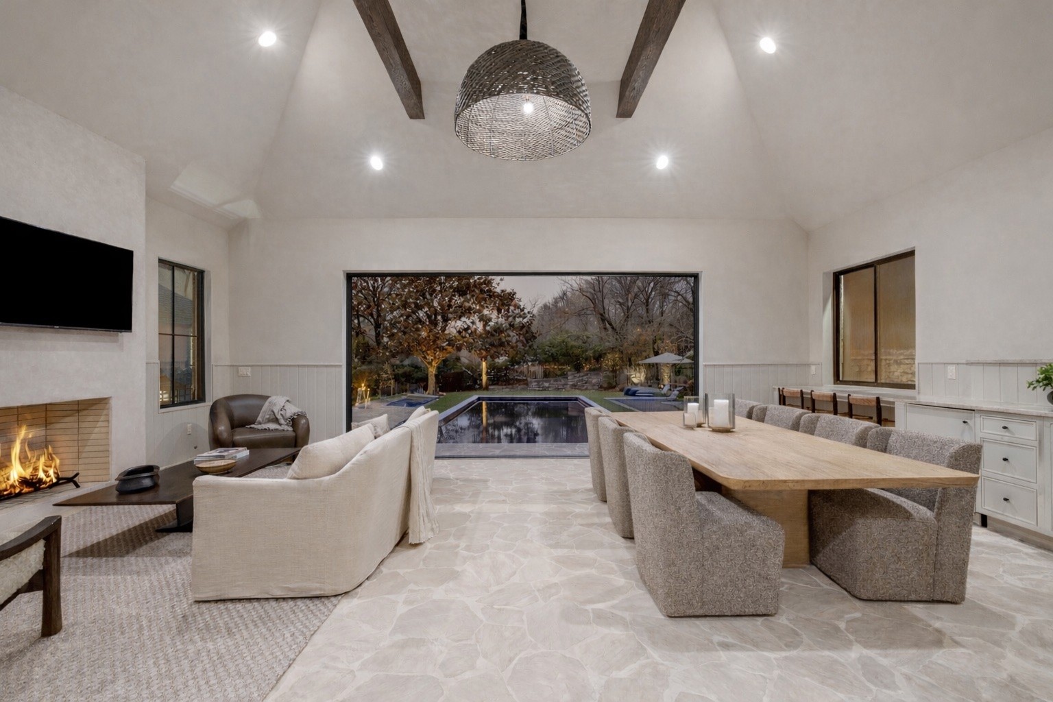 1049 Overton Lea Road Nashville, TN 37220 - Photo 47 of 53 a living room with furniture a fireplace and a flat screen tv