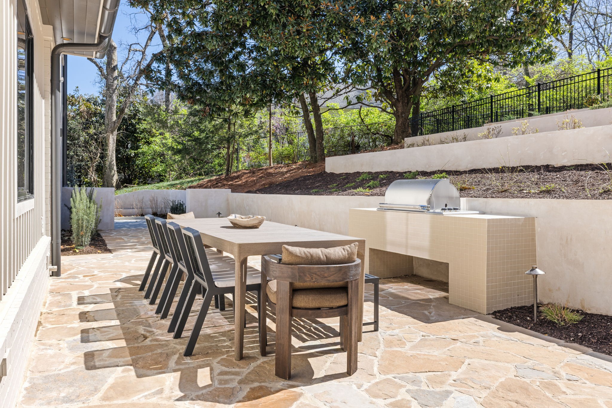 1049 Overton Lea Road Nashville, TN 37220 - Photo 49 of 53 a patio with table and chairs