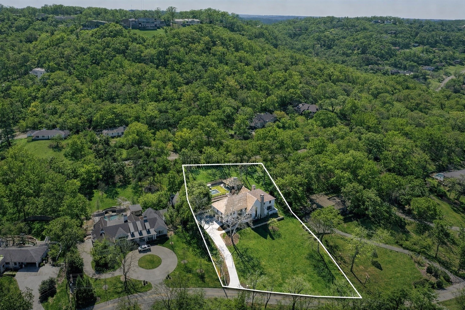 1049 Overton Lea Road Nashville, TN 37220 - Photo 52 of 53 an aerial view of a house with a yard
