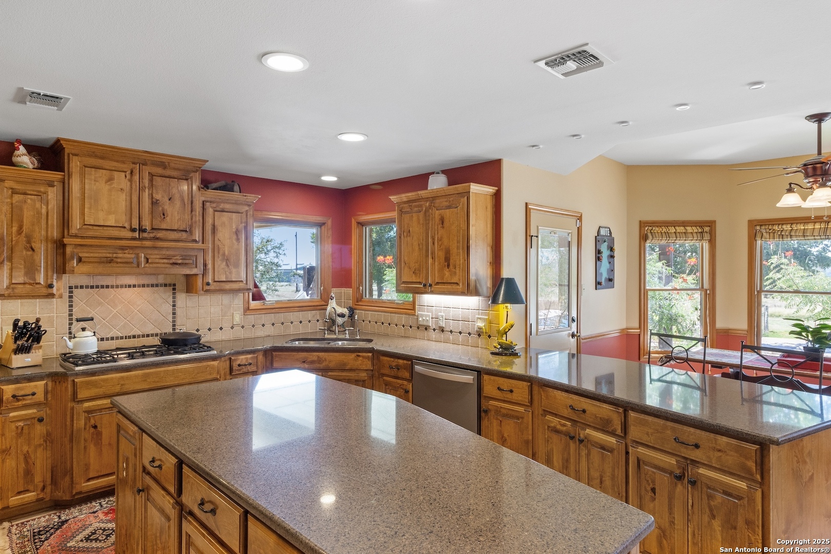 647 Funf Kinder Road Fredericksburg, TX 78624 - Photo 42 of 100 a kitchen with lots of counter top space and sink