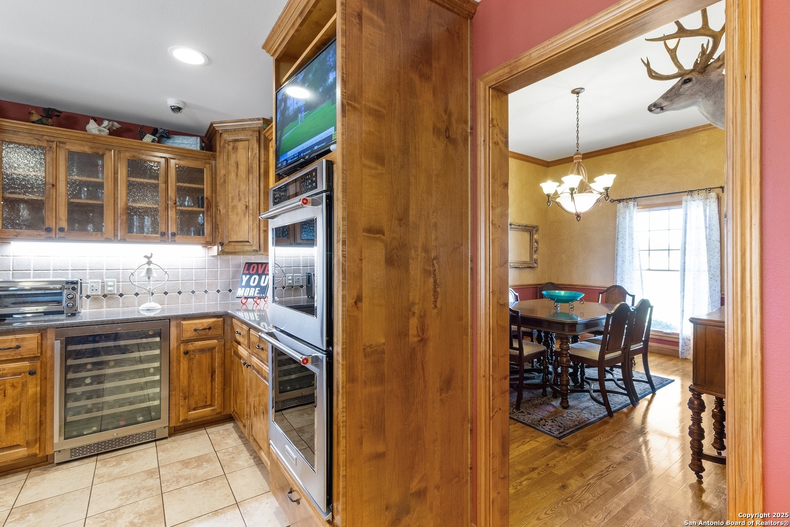 647 Funf Kinder Road Fredericksburg, TX 78624 - Photo 44 of 100 a kitchen with stainless steel appliances granite countertop a stove and a sink