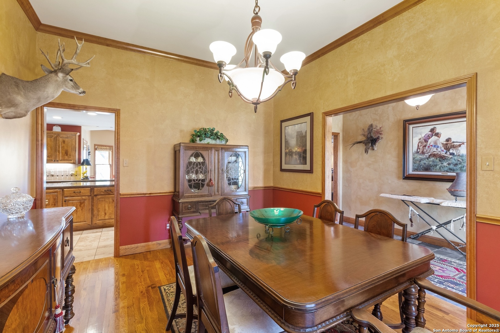 647 Funf Kinder Road Fredericksburg, TX 78624 - Photo 45 of 100 a view of a dining room with furniture and a chandelier
