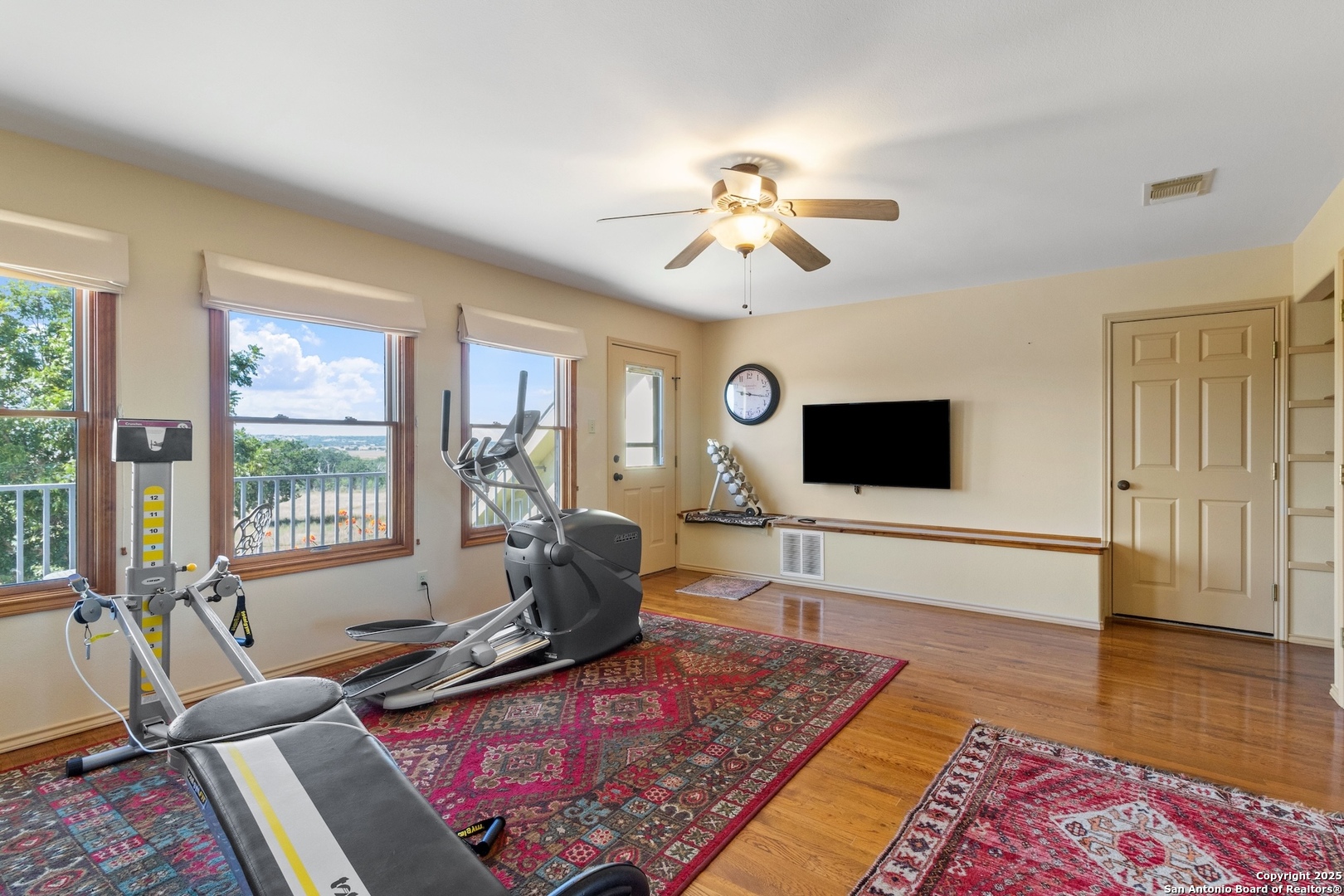 647 Funf Kinder Road Fredericksburg, TX 78624 - Photo 67 of 100 a living room with furniture and a flat screen tv