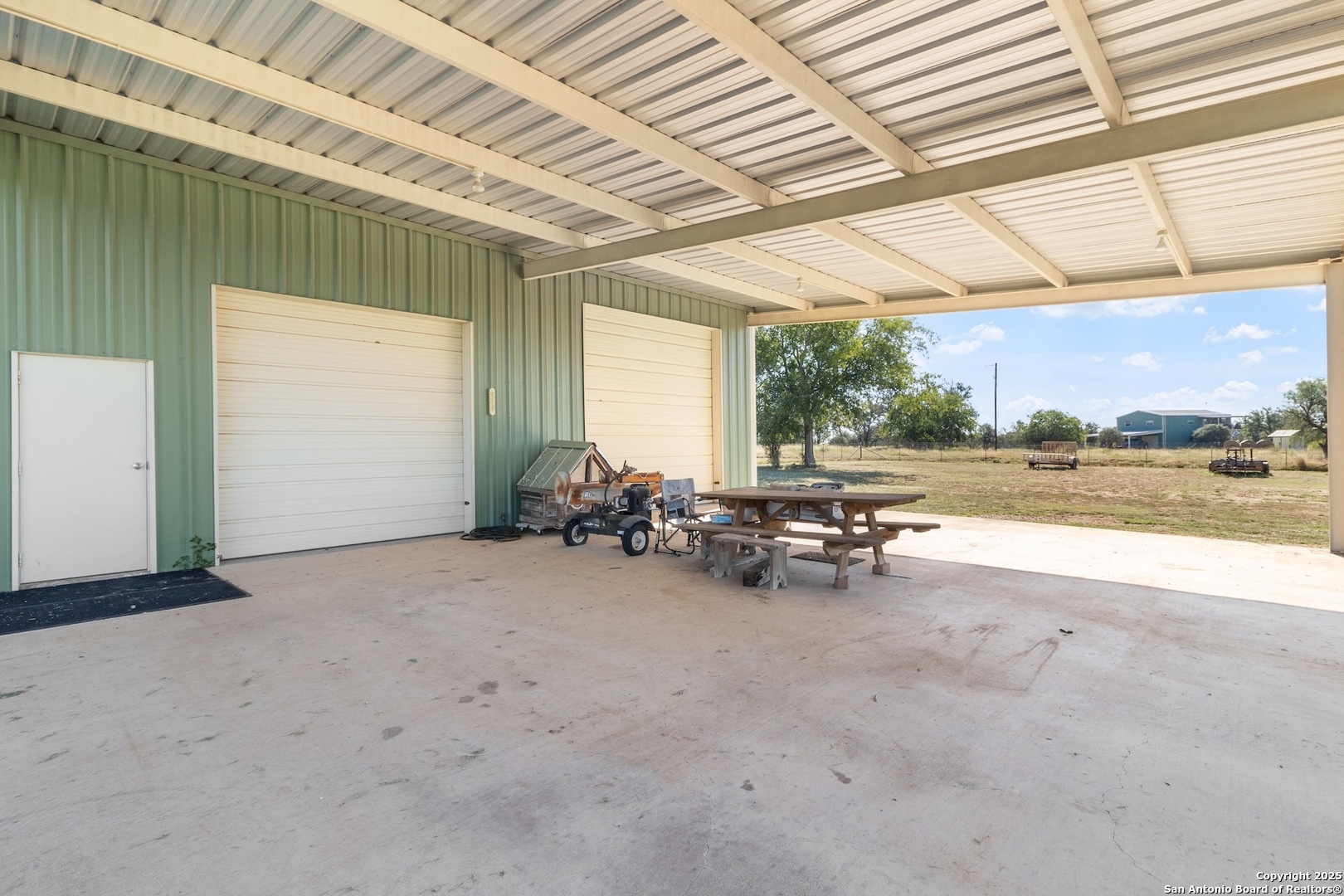 647 Funf Kinder Road Fredericksburg, TX 78624 - Photo 75 of 100 a view of a room with wooden walls