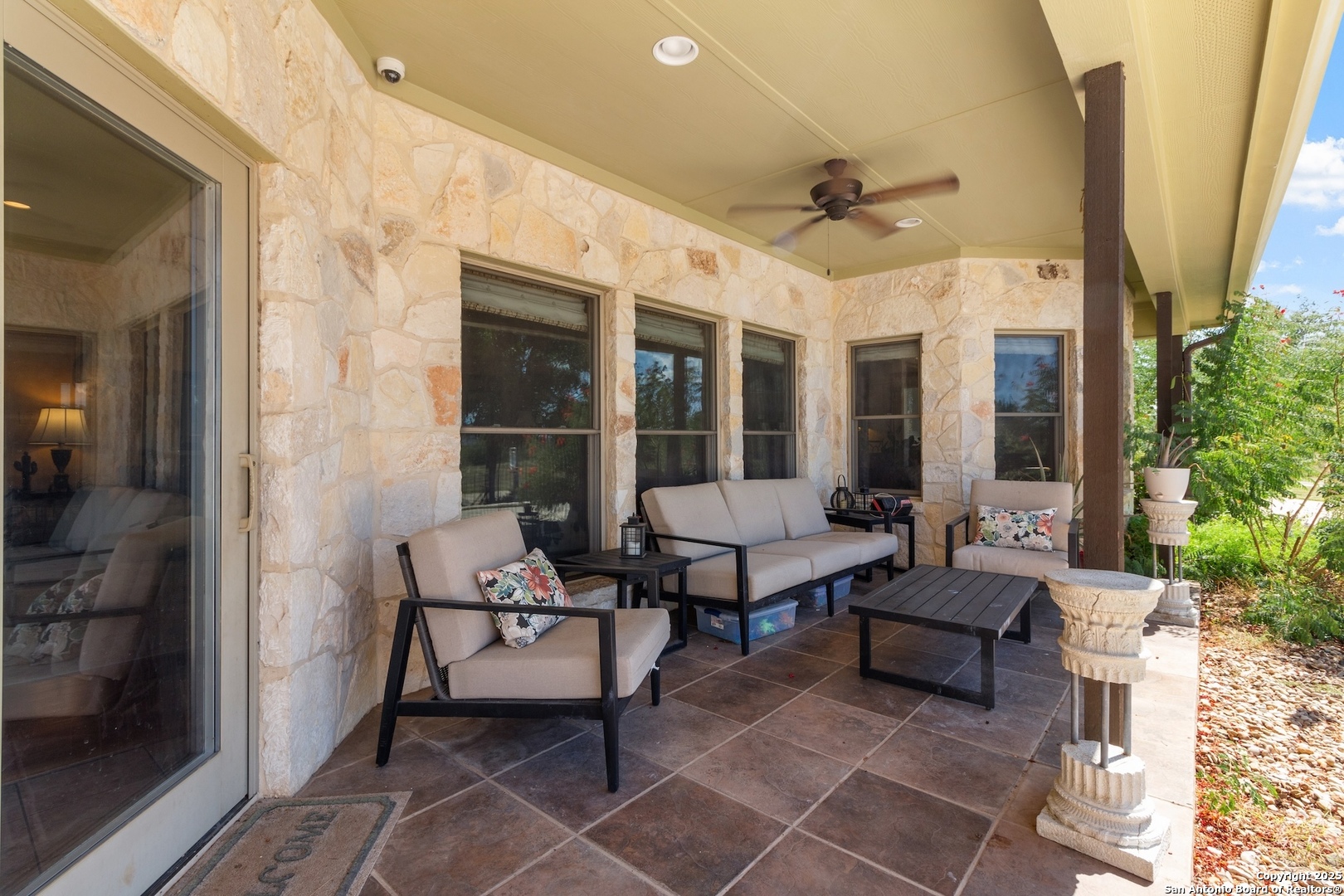 647 Funf Kinder Road Fredericksburg, TX 78624 - Photo 93 of 100 a balcony with furniture and a potted plant