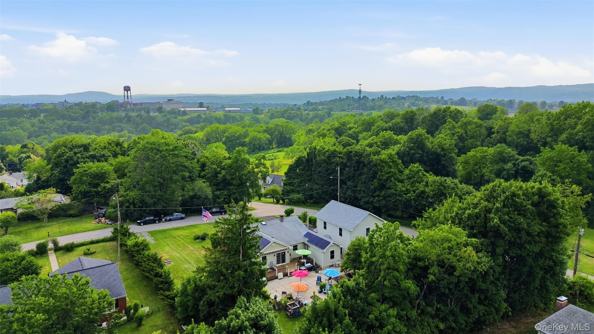 1 Hiko Place Fishkill, NY 12524 - Photo 41 of 41 Expansive property featuring a large patio, mature trees, and solar panels