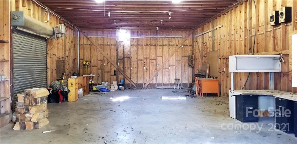 6901 Medlin Road Monroe, NC 28112 - Photo 8 of 23 a view of a room with gym equipment