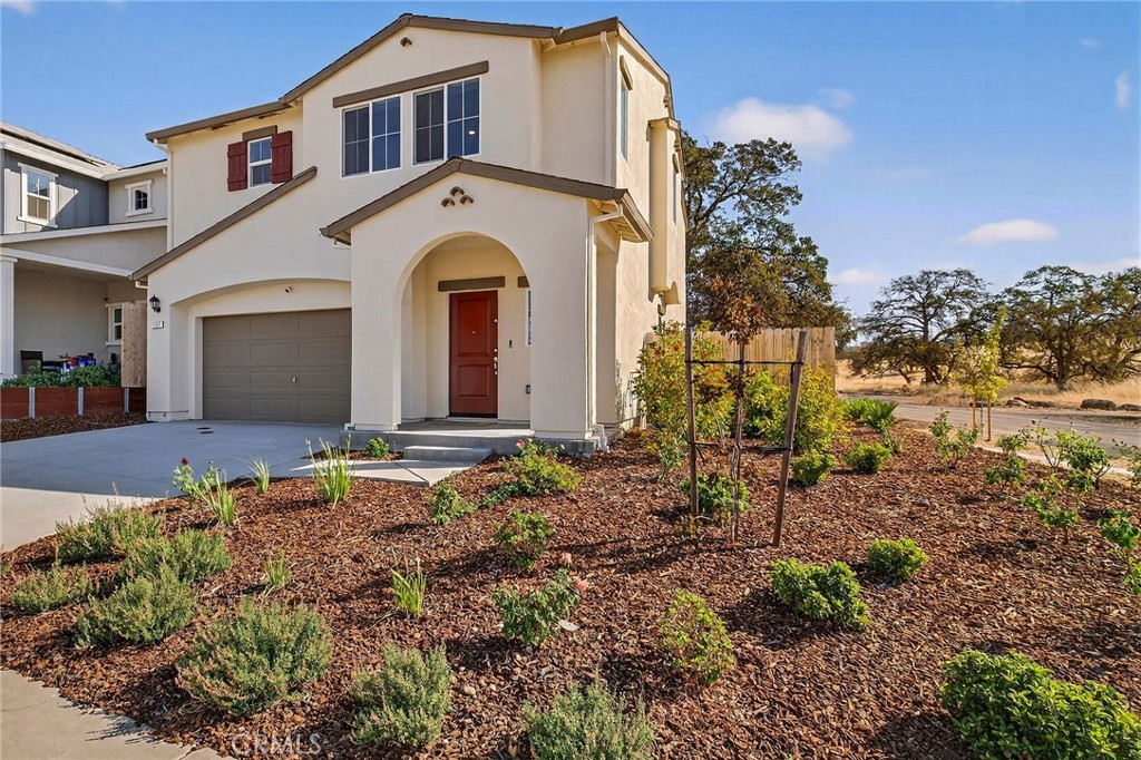 1147 Lentil Way Chico, CA 95928 - Photo 12 of 72 a front view of a house with a yard