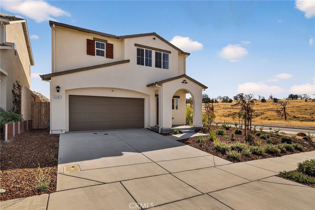 1147 Lentil Way Chico, CA 95928 - Photo 13 of 72 a front view of a house with sitting area