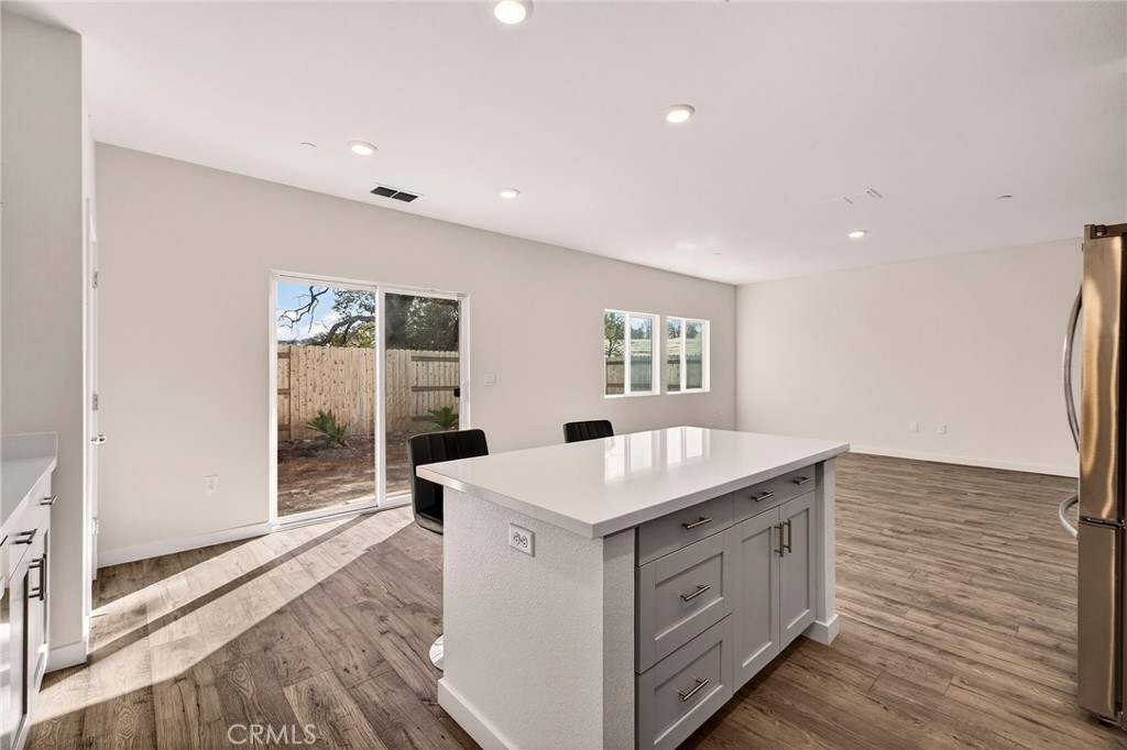 1147 Lentil Way Chico, CA 95928 - Photo 30 of 72 a kitchen with a sink stove and cabinets