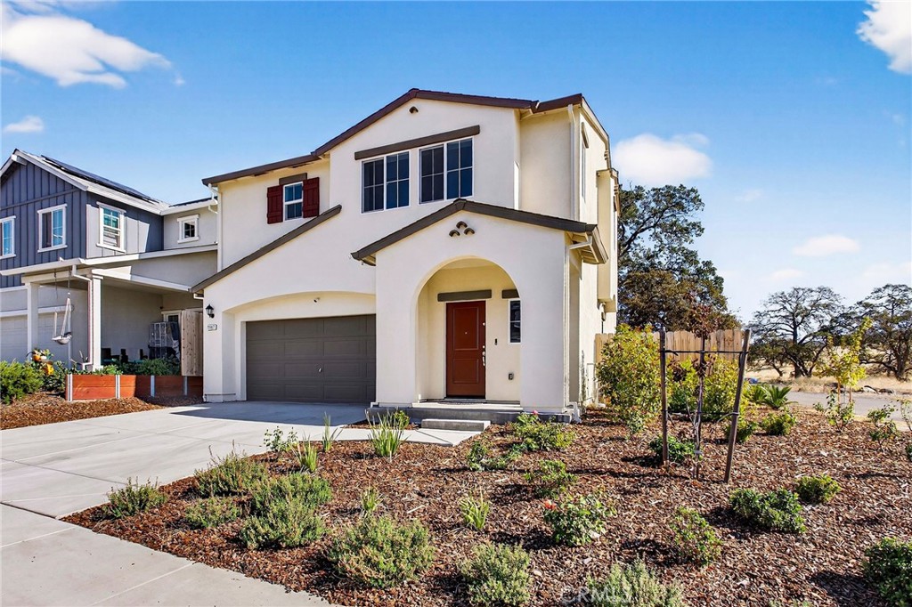 1147 Lentil Way Chico, CA 95928 - Photo 3 of 72 a front view of a house with a yard