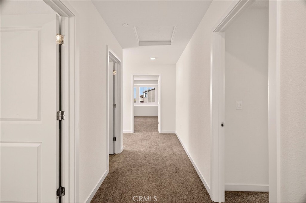 1147 Lentil Way Chico, CA 95928 - Photo 31 of 72 a view of a hallway with a white walls