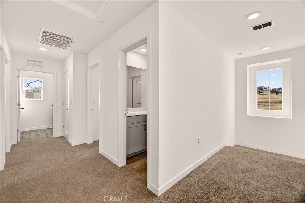 1147 Lentil Way Chico, CA 95928 - Photo 32 of 72 an empty room with windows and closet