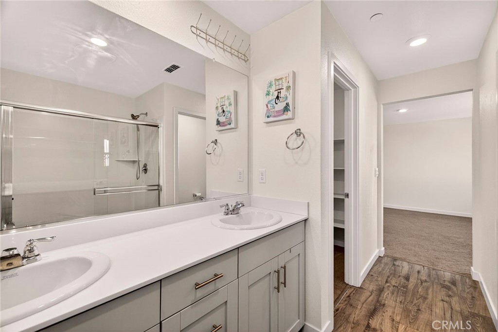 1147 Lentil Way Chico, CA 95928 - Photo 39 of 72 a bathroom with a double vanity sink mirror and double