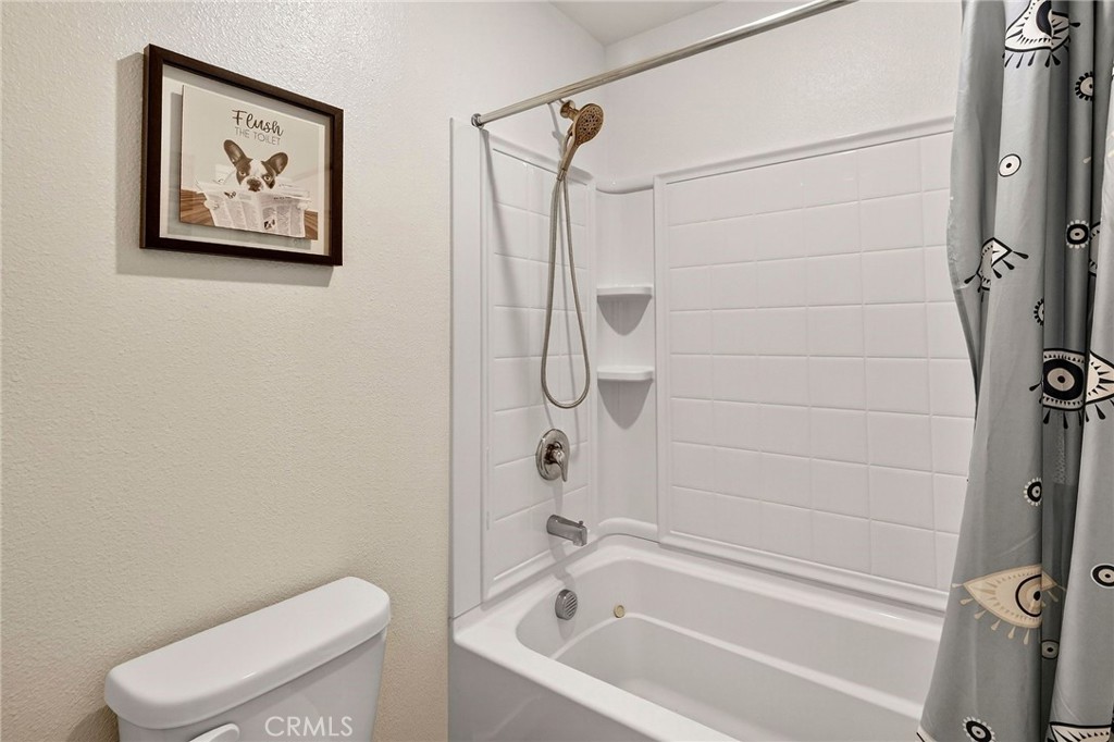 1147 Lentil Way Chico, CA 95928 - Photo 45 of 72 a bathroom with a toilet and a shower