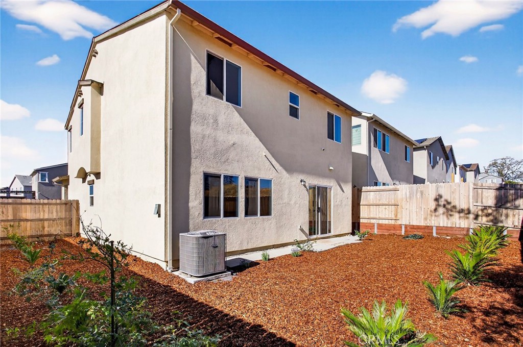 1147 Lentil Way Chico, CA 95928 - Photo 53 of 72 a front view of a house with a yard