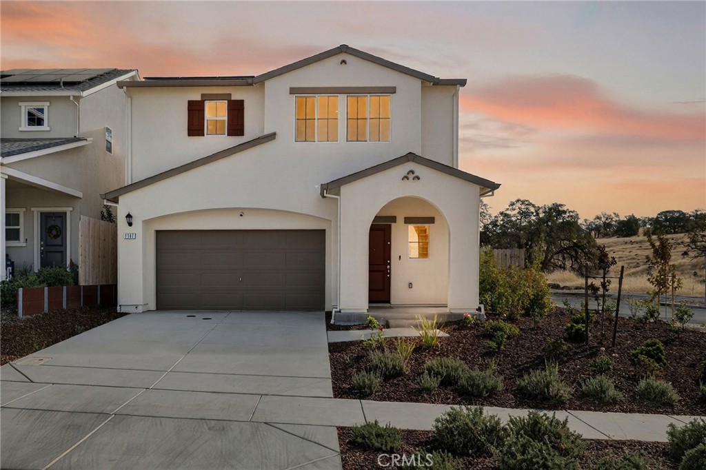1147 Lentil Way Chico, CA 95928 - Photo 7 of 72 a front view of a house with a garden