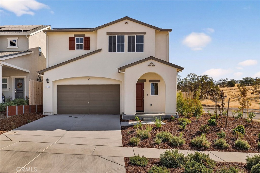 1147 Lentil Way Chico, CA 95928 - Photo 8 of 72 a front view of a house with a yard