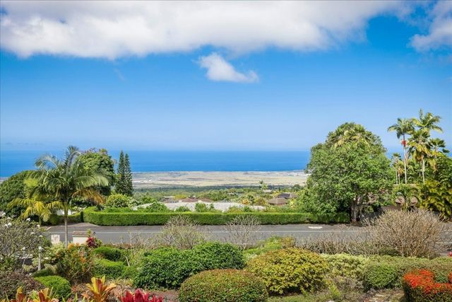 a view of a lake with a building in the background
