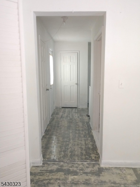 83 Allen Street, Unit 1 Netcong, NJ 07857 - Photo 13 of 16 a view of a hallway with wooden floor