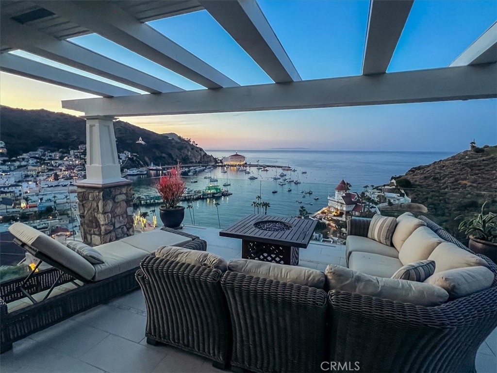 133 Upper Terrace Road Avalon, CA 90704 - Photo 17 of 72 a outdoor living space with furniture and a fireplace