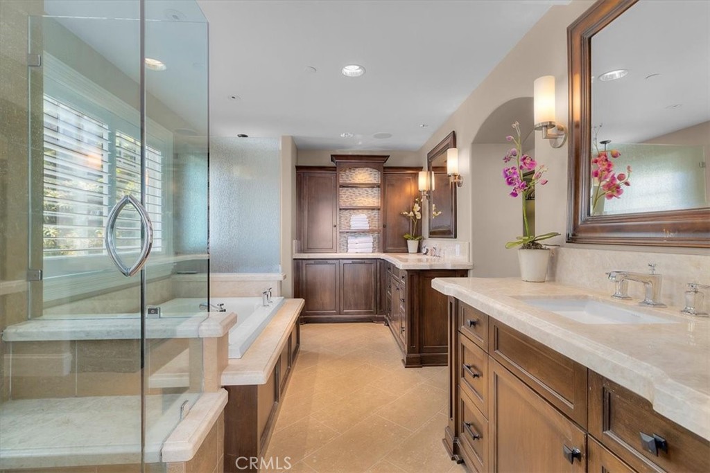 133 Upper Terrace Road Avalon, CA 90704 - Photo 22 of 72 a large bathroom with a granite countertop sink mirror and bathtub