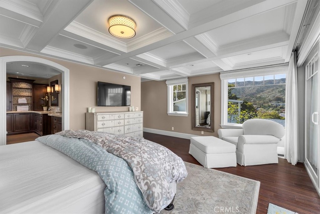 133 Upper Terrace Road Avalon, CA 90704 - Photo 26 of 72 a bedroom with a large bed and a couch