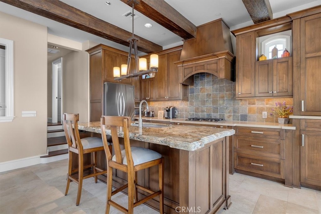 133 Upper Terrace Road Avalon, CA 90704 - Photo 39 of 72 a kitchen with a sink cabinets and window