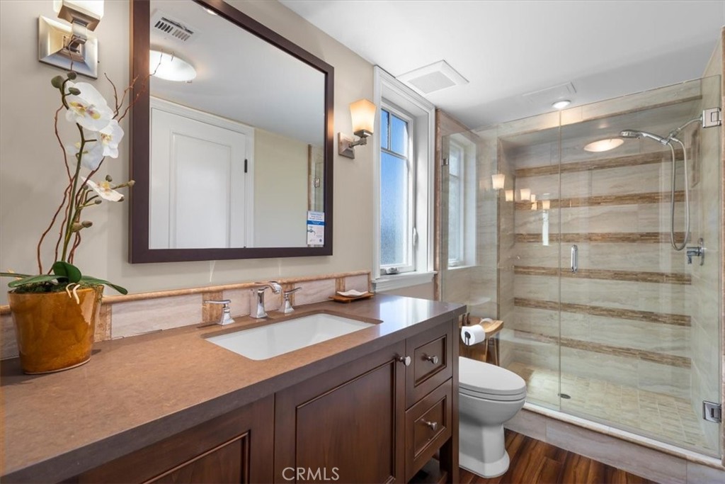 133 Upper Terrace Road Avalon, CA 90704 - Photo 50 of 72 a bathroom with a sink a toilet and shower