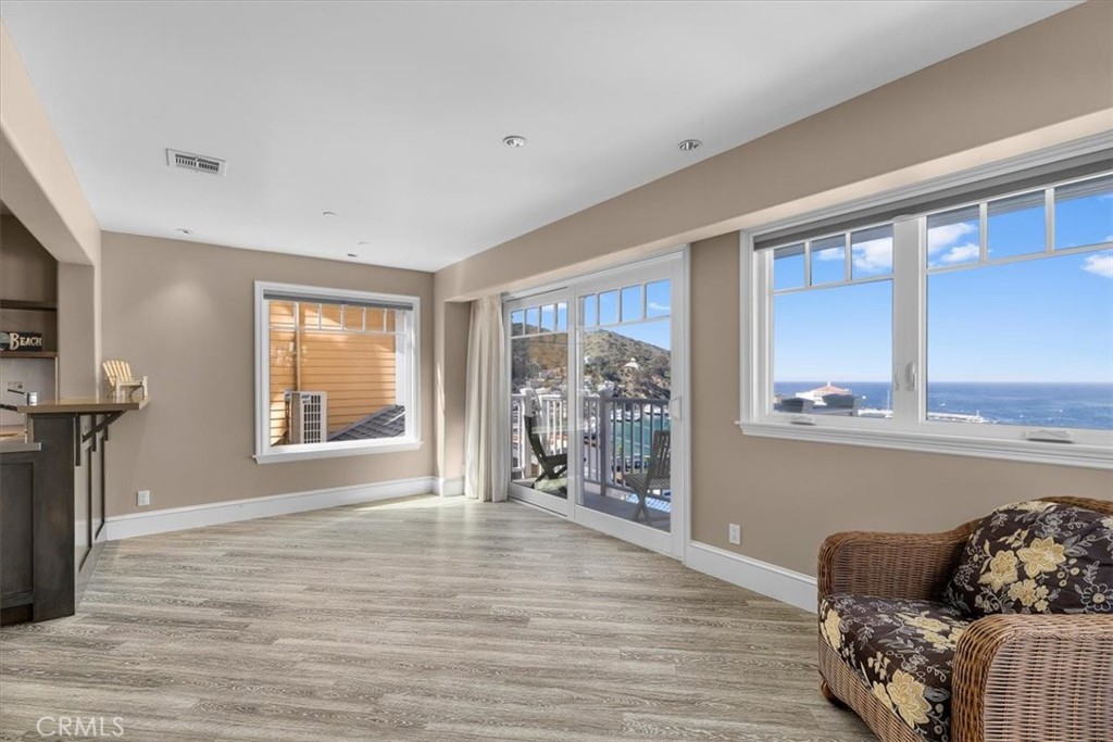 133 Upper Terrace Road Avalon, CA 90704 - Photo 55 of 72 a living room with furniture and a window