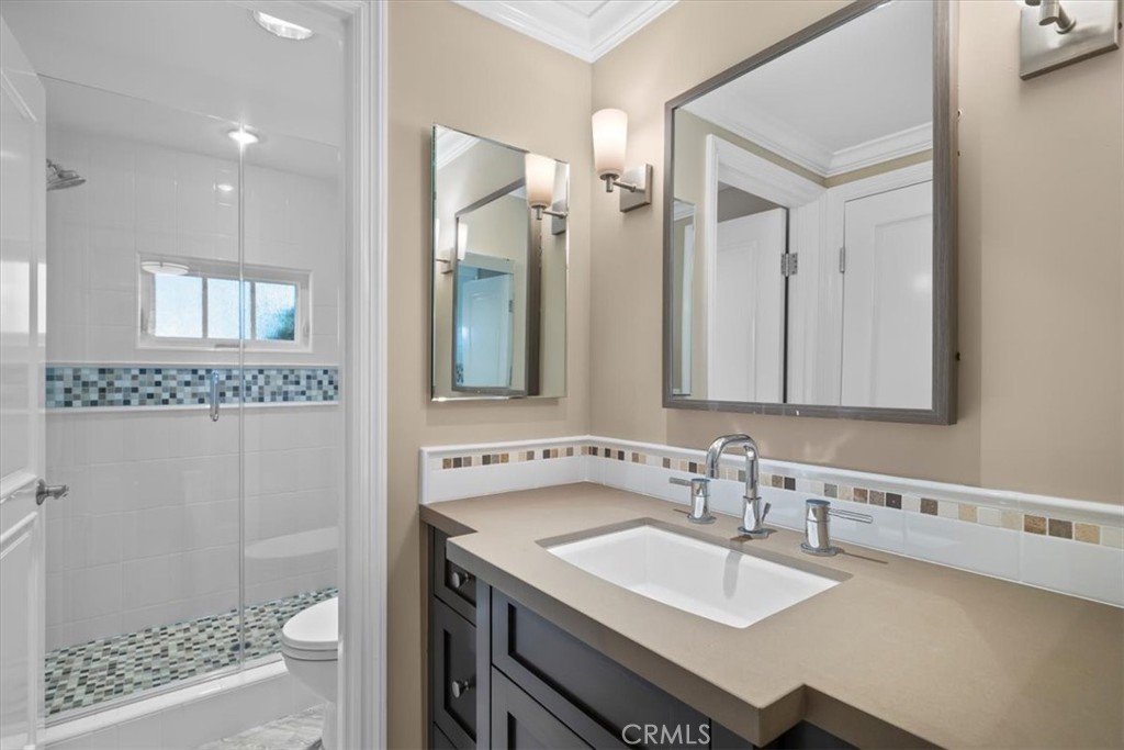 133 Upper Terrace Road Avalon, CA 90704 - Photo 60 of 72 a bathroom with a sink and a mirror