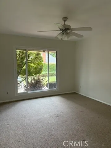 a view of a room with a large window