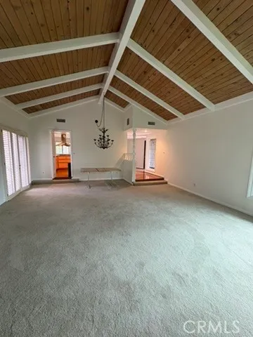 a view of empty room with windows