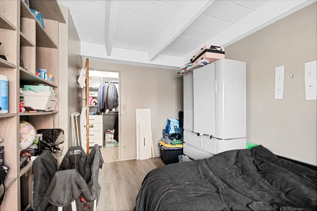 a bed room with a bed and a couch