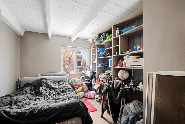 a view of a closet area with storage
