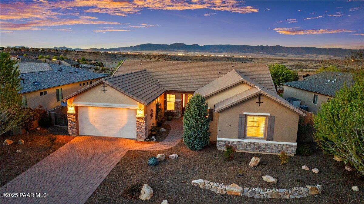 1149 Stack Rock Road Prescott Valley, AZ 86314 - Photo 2 of 85 a view of a house with yard and lake view