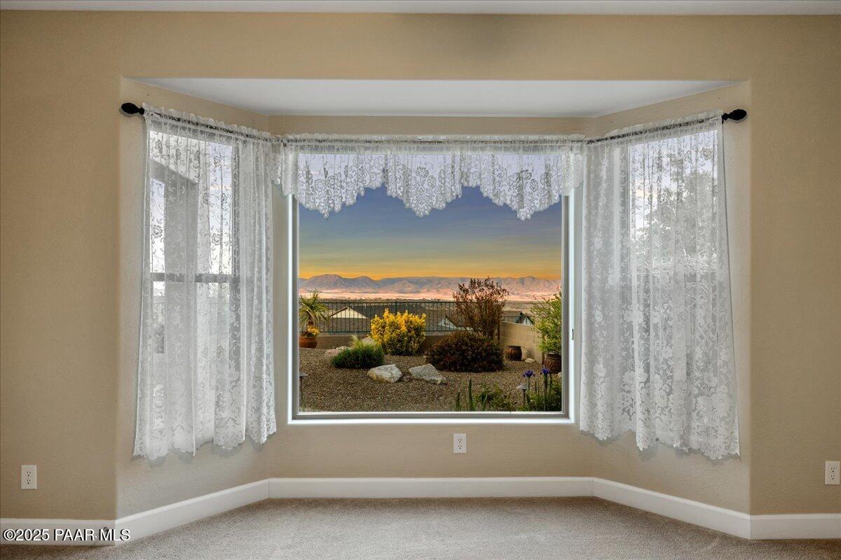 1149 Stack Rock Road Prescott Valley, AZ 86314 - Photo 22 of 85 a view of a glass door and a window
